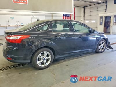 Trzecie zdjęcie samochodu z tyłu: 2013 FORD FOCUS SE VIN:1FADP3F2XDL118249 - miniatura