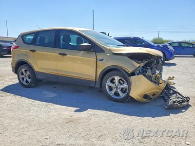 Czwarte zdjęcie samochodu z boku: 2014 FORD ESCAPE S VIN:1FMCU0F77EUE23272 - miniatura