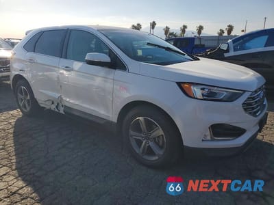 Czwarte zdjęcie samochodu z boku: 2020 FORD EDGE SEL VIN:2FMPK3J94LBA19754 - miniatura