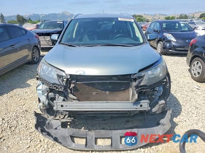 Piąte zdjęcie samochodu w środku: 2012 HONDA CR-V EXL VIN:JHLRM4H70CC020095 - miniatura