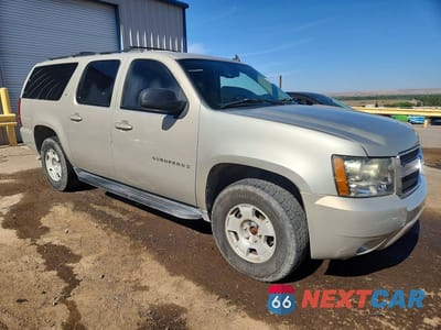 Czwarte zdjęcie samochodu z boku: 2007 CHEVROLET SUBURBAN C1500 VIN:1GNFC16J57J191191 - miniatura