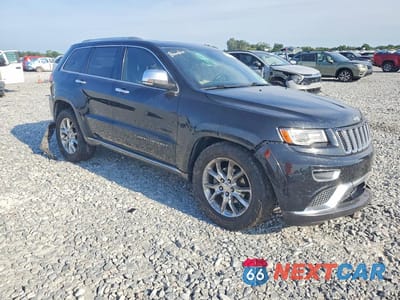 Czwarte zdjęcie samochodu z boku: 2014 JEEP GRAND CHEROKEE SUMMIT VIN:1C4RJEJT7EC438014 - miniatura