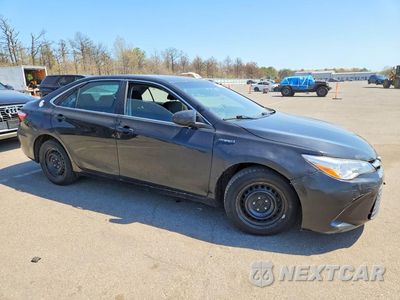 Czwarte zdjęcie samochodu z boku: 2017 TOYOTA CAMRY HYBRID LE VIN:4T1BD1FKXHU220452 - miniatura