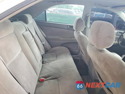 Zdjęcie 10 z 12 samochodu: 2003 TOYOTA CAMRY LE VIN:4T1BE32K13U226566 - miniatura