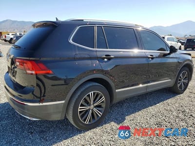 Trzecie zdjęcie samochodu z tyłu: 2019 VOLKSWAGEN TIGUAN SE VIN:3VV3B7AX5KM061373 - miniatura
