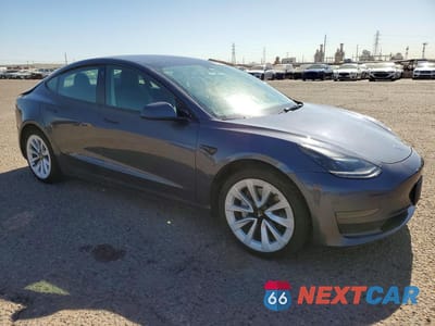 Czwarte zdjęcie samochodu z boku: 2022 TESLA MODEL 3 VIN:5YJ3E1EA8NF303896 - miniatura
