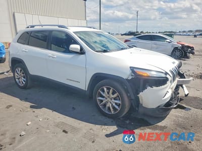 Czwarte zdjęcie samochodu z boku: 2014 JEEP CHEROKEE LIMITED VIN:1C4PJLDB8EW292929 - miniatura