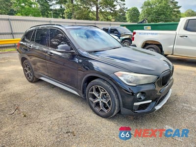 Czwarte zdjęcie samochodu z boku: 2017 BMW X1 SDRIVE28I VIN:WBXHU7C33H5H38014 - miniatura