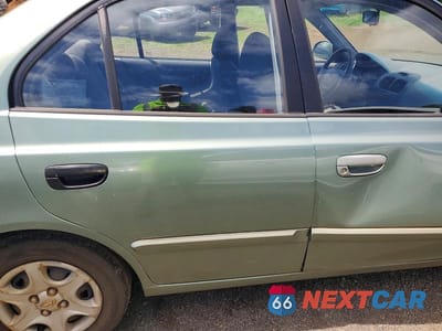 Zdjęcie 10 z 12 samochodu: 2003 HYUNDAI ACCENT GL VIN:KMHCG45C33U429984 - miniatura