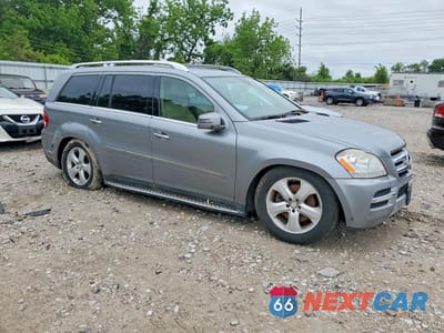 Czwarte zdjęcie samochodu z boku: 2012 MERCEDES-BENZ GL 450 4MATIC VIN:4JGBF7BE2CA781025 - miniatura