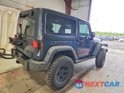 Trzecie zdjęcie samochodu z tyłu: 2017 JEEP WRANGLER SPORT VIN:1C4AJWAGXHL577113 - miniatura