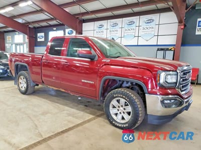 Czwarte zdjęcie samochodu z boku: 2017 GMC SIERRA K1500 SLE VIN:1GTV2MEC5HZ141860 - miniatura