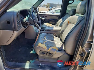 Zdjęcie 7 z 14 samochodu: 2002 CHEVROLET SUBURBAN C VIN:1GNEC16T02J238066 - miniatura