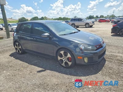 Czwarte zdjęcie samochodu z boku: 2013 VOLKSWAGEN GTI VIN:WVWGV7AJ1DW122305 - miniatura
