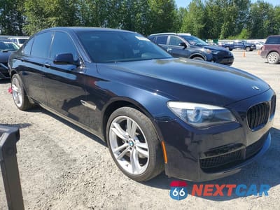 Czwarte zdjęcie samochodu z boku: 2011 BMW 740 I VIN:WBAKA4C52BC392093 - miniatura