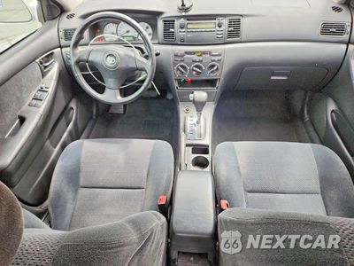 Zdjęcie 8 z 12 samochodu: 2003 TOYOTA COROLLA CE VIN:1NXBR32E63Z153063 - miniatura