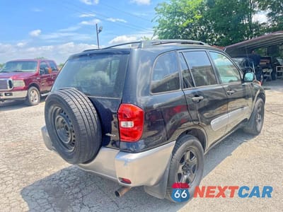 Czwarte zdjęcie samochodu z boku: 2004 TOYOTA RAV4 BASE VIN:JTEHD20V046013733 - miniatura