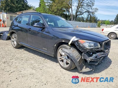 Czwarte zdjęcie samochodu z boku: 2015 BMW X1 XDRIVE35I VIN:WBAVM5C50FVV93799 - miniatura