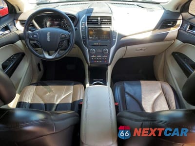 Zdjęcie 8 z 13 samochodu: 2015 LINCOLN MKC VIN:5LMCJ2A94FUJ00695 - miniatura