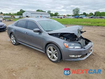 Czwarte zdjęcie samochodu z boku: 2015 VOLKSWAGEN PASSAT SE VIN:1VWBV7A33FC070592 - miniatura