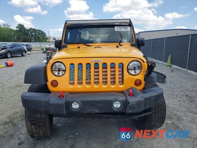 Piąte zdjęcie samochodu w środku: 2012 JEEP WRANGLER UNLIMITED SPORT VIN:1C4BJWDG7CL120428 - miniatura