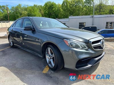 Czwarte zdjęcie samochodu z boku: 2014 MERCEDES-BENZ E 63 AMG-S VIN:WDDHF7GB6EA940456 - miniatura