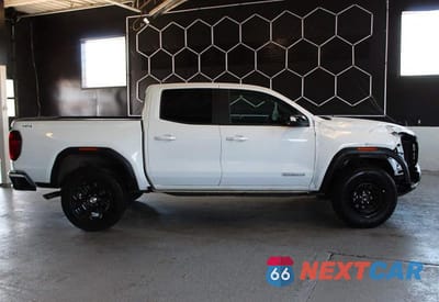 Trzecie zdjęcie samochodu z tyłu: 2024 GMC CANYON ELEVATION VIN:1GTP6BEK9R1135651 - miniatura