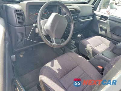 Zdjęcie 8 z 13 samochodu: 2002 JEEP WRANGLER / TJ SPORT VIN:1J4FA49S52P723947 - miniatura