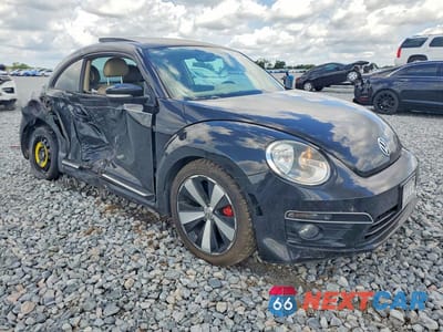 Czwarte zdjęcie samochodu z boku: 2013 VOLKSWAGEN BEETLE TURBO VIN:3VWVT7AT7DM681966 - miniatura