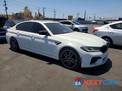 Czwarte zdjęcie samochodu z boku: 2021 BMW M5 VIN:WBS83CH00MCF82410 - miniatura