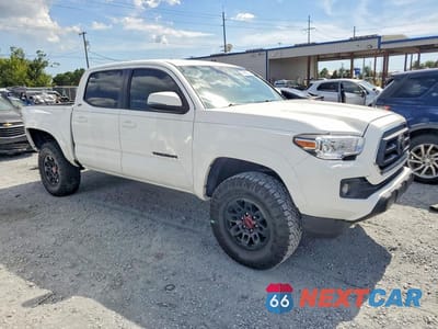 Czwarte zdjęcie samochodu z boku: 2022 TOYOTA TACOMA SR5 V6 VIN:3TMAZ5CN5NM169255 - miniatura
