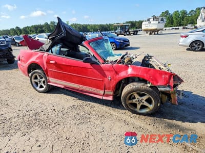 Czwarte zdjęcie samochodu z boku: 2002 FORD MUSTANG VIN:1FAFP44442F166893 - miniatura