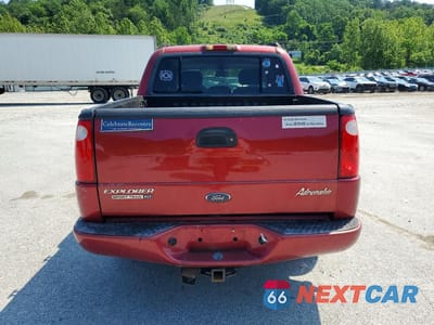 Zdjęcie 6 z 12 samochodu: 2004 FORD EXPLORER SPORT TRAC VIN:1FMZU77K64UB49888 - miniatura