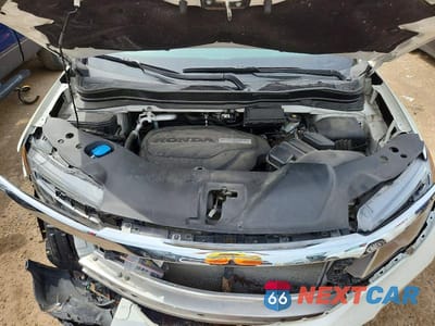 Zdjęcie 11 z 12 samochodu: 2018 HONDA PILOT EXLN VIN:5FNYF6H77JB059149 - miniatura