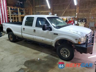 Czwarte zdjęcie samochodu z boku: 2002 FORD F350 SRW SUPER DUTY VIN:1FTSW31S42EA45876 - miniatura