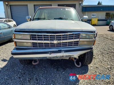 Piąte zdjęcie samochodu w środku: 1991 CHEVROLET GMT-400 K2500 VIN:1GCGK24K4ME114026 - miniatura