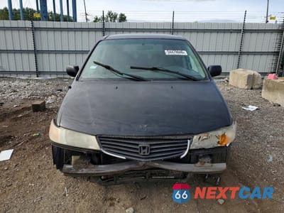Piąte zdjęcie samochodu w środku: 2000 HONDA ODYSSEY LX VIN:2HKRL1857YH596386 - miniatura