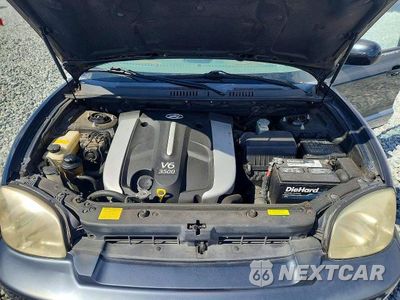 Zdjęcie 12 z 13 samochodu: 2005 HYUNDAI SANTA FE GLS VIN:KM8SC13E95U878714 - miniatura