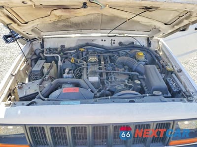 Zdjęcie 12 z 13 samochodu: 1999 JEEP CHEROKEE SE VIN:1J4FT28S7XL602237 - miniatura