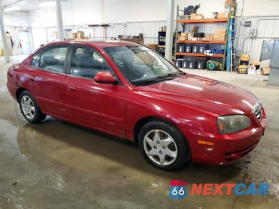 Czwarte zdjęcie samochodu z boku: 2004 HYUNDAI ELANTRA GLS VIN:KMHDN46D04U708926 - miniatura