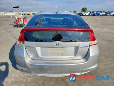 Zdjęcie 6 z 13 samochodu: 2010 HONDA INSIGHT LX VIN:JHMZE2H58AS040058 - miniatura
