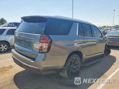 Trzecie zdjęcie samochodu z tyłu: 2021 CHEVROLET TAHOE K1500 LT VIN:1GNSKNKD5MR399478 - miniatura