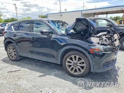 Czwarte zdjęcie samochodu z boku: 2019 MAZDA CX-5 GRAND TOURING VIN:JM3KFBDM6K0552242 - miniatura