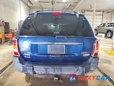 Zdjęcie 6 z 13 samochodu: 2003 JEEP GRAND CHEROKEE LAREDO VIN:1J4GW48S53C570261 - miniatura