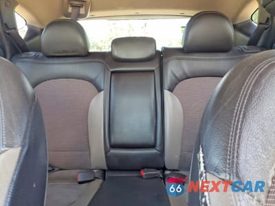 Zdjęcie 10 z 13 samochodu: 2011 HYUNDAI TUCSON GLS VIN:KM8JUCAC7BU264472 - miniatura