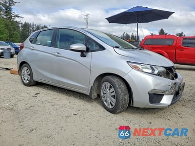 Czwarte zdjęcie samochodu z boku: 2015 HONDA FIT LX VIN:3HGGK5H51FM774691 - miniatura