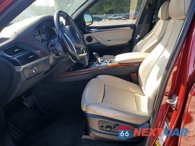 Zdjęcie 7 z 13 samochodu: 2012 BMW X5 XDRIVE50I VIN:5UXZV8C50CL425167 - miniatura