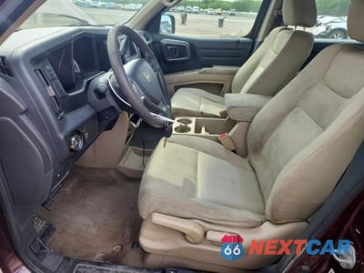 Zdjęcie 7 z 12 samochodu: 2010 HONDA RIDGELINE RT VIN:5FPYK1F20AB012350 - miniatura