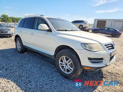 Czwarte zdjęcie samochodu z boku: 2008 VOLKSWAGEN TOUAREG 2 V6 VIN:WVGBE77L68D055524 - miniatura