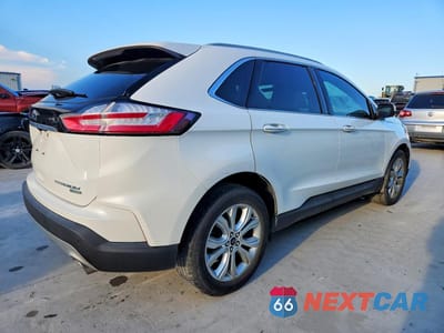 Trzecie zdjęcie samochodu z tyłu: 2020 FORD EDGE TITANIUM VIN:2FMPK3K91LBB19342 - miniatura